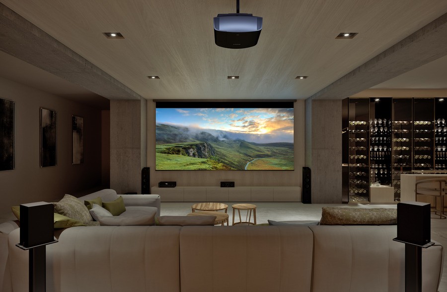 A luxury home theater with a projector displaying a landscape.